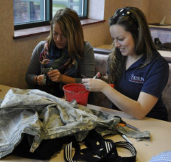 Cutting rag at Sitrin Health Care Center