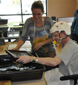 Cutting rag at Sitrin Health Care Center
